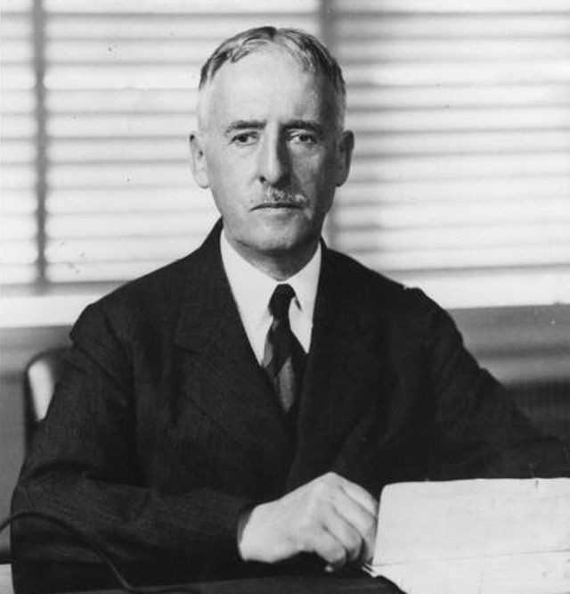 Henry L. Stinson at his desk.