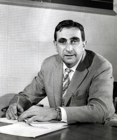 Edward Teller writing on some papers.