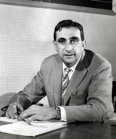 Edward Teller writing on some papers.