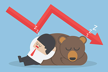 Businessman sleeping with bear with down trend graph