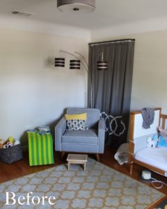 Kid's room with a grey fabric chair and beige rug