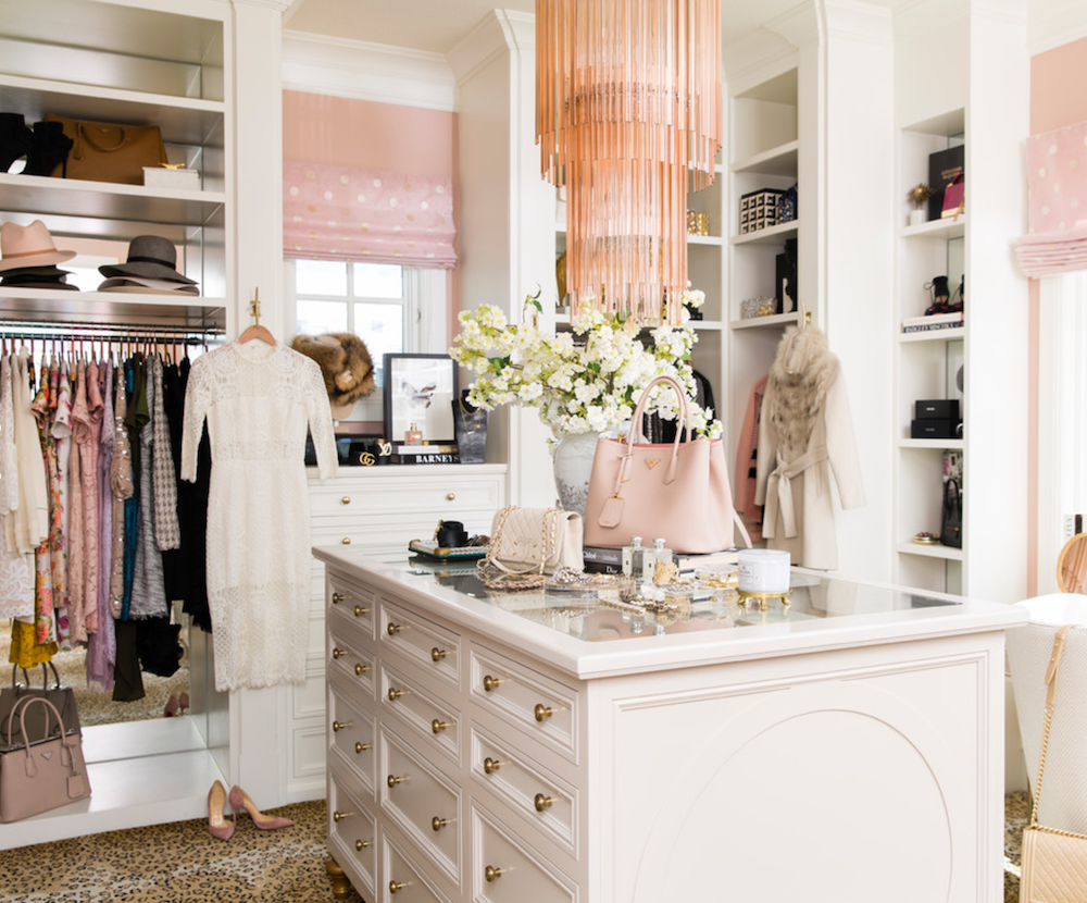 light pink storage workbench in large white closet