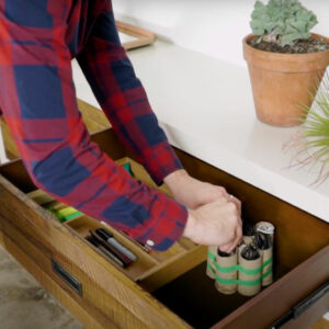 organizing supplies in drawer