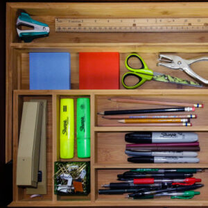 utensil organizer with various office supplies