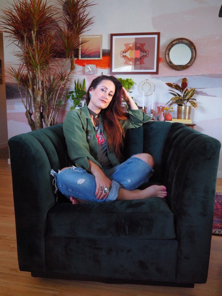 woman sitting on black chair