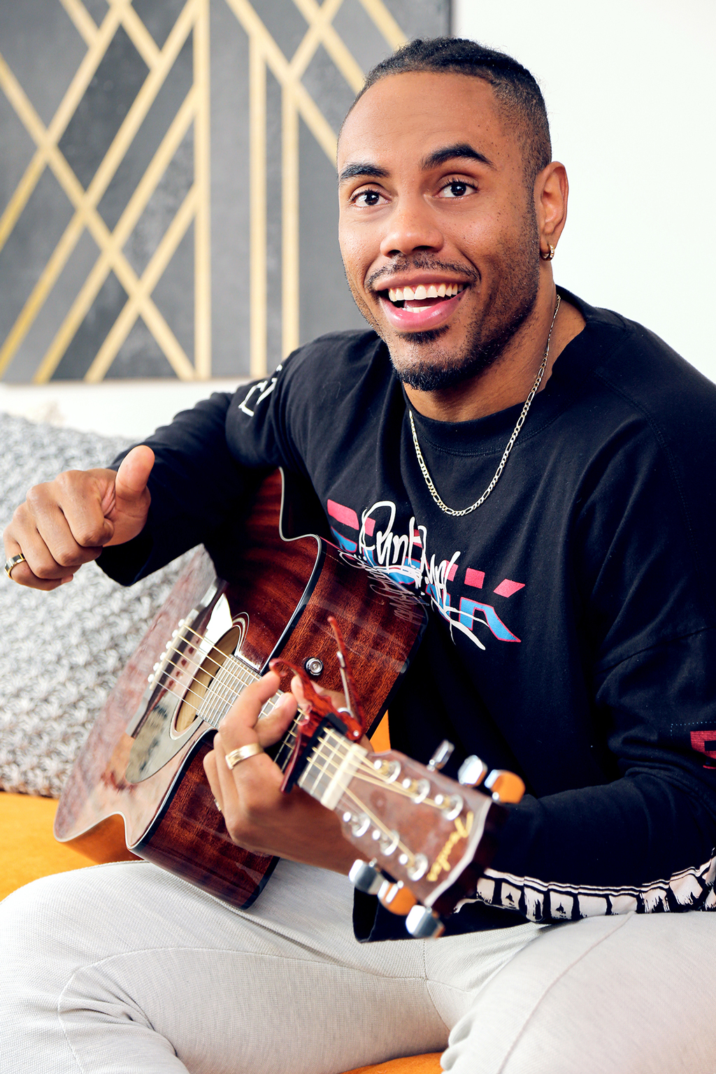 man playing a guitar