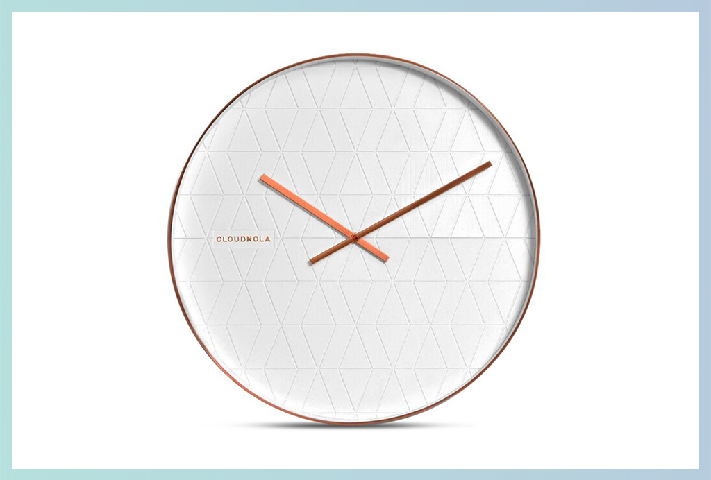 white geometric wall clock