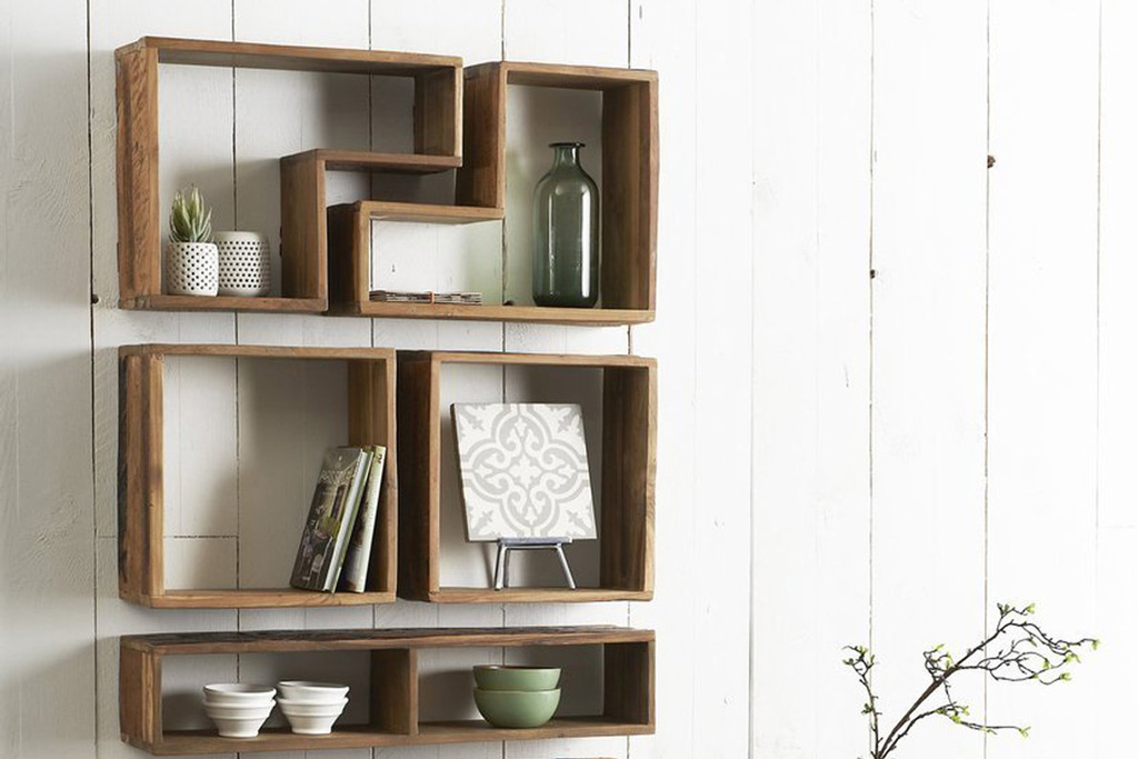 wall storage wall shelves with plants, bowls and books in it