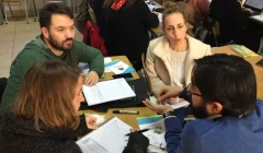 grupo de docentes en trabajo conjunto en el curso de capacitación