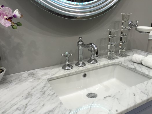 3 hole washbasin mixer with crystal knobs on a country style vanity unit