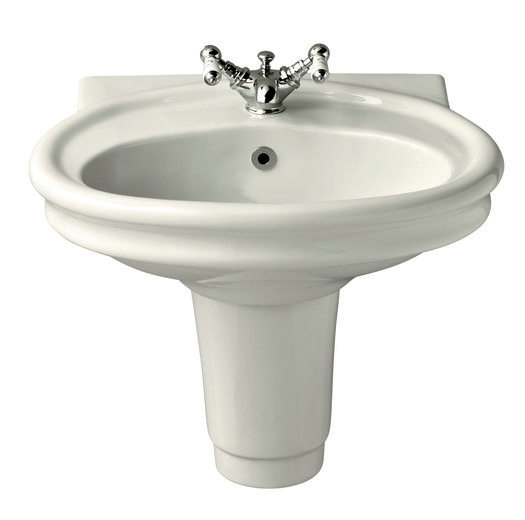 Vintage washbasin on semi - pedestal