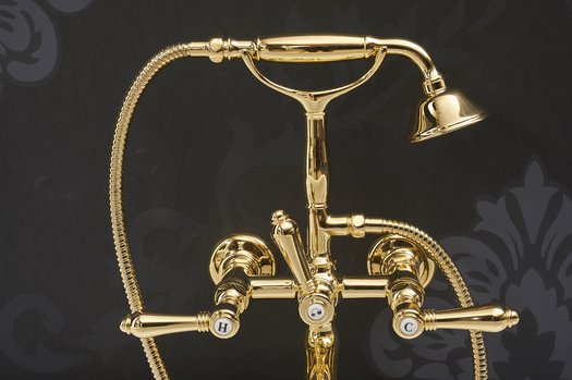 Bathtub faucet in retro style in gold finish