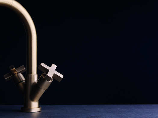 Elegant lavabo faucet in brushed brass finish