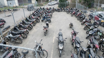 Police auction motorcycles and scooters: An analysis of institutional disposal and public acquisition processes