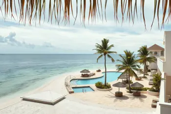 A journalistic tropical beachfront scene representing all-inclusive vacation research for Playa del Carmen in 2026