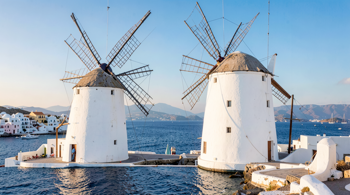 Pacchetto vacanze tutto incluso di 7 giorni a Mykonos con voli e trasferimenti aeroportuali: Analisi tecnica dell'offerta turistica