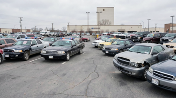 Surplus sedans and utility trucks available through U.S. police auctions 2026
