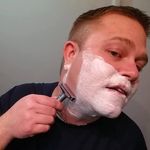 Rich Man Shaving