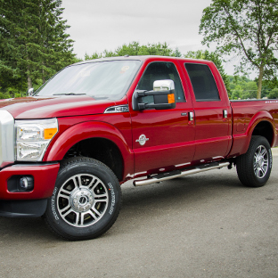 2016 Ford F350 Super Duty with ARIES 4-inch oval side bars