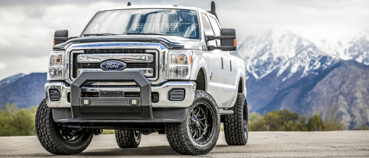 Custom 2013 Ford F250 Super Duty with ARIES AdvantEDGE™ bull bar with LED lights