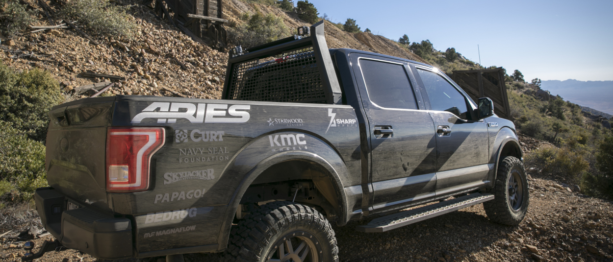 Custom black 2016 Ford F150 with ARIES AdvantEDGE™ truck headache rack Custom black 2016 Ford F150 with ARIES AdvantEDGE™ truck headache rack
