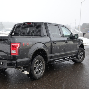 2015 Ford F150 with ARIES AdvantEDGE side bars running boards - snow