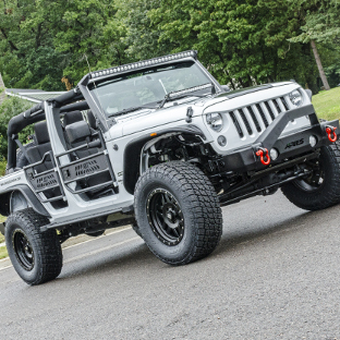 White custom Jeep Wrangler JK with Jeep doors, TrailCrusher™ bumper and fender flares