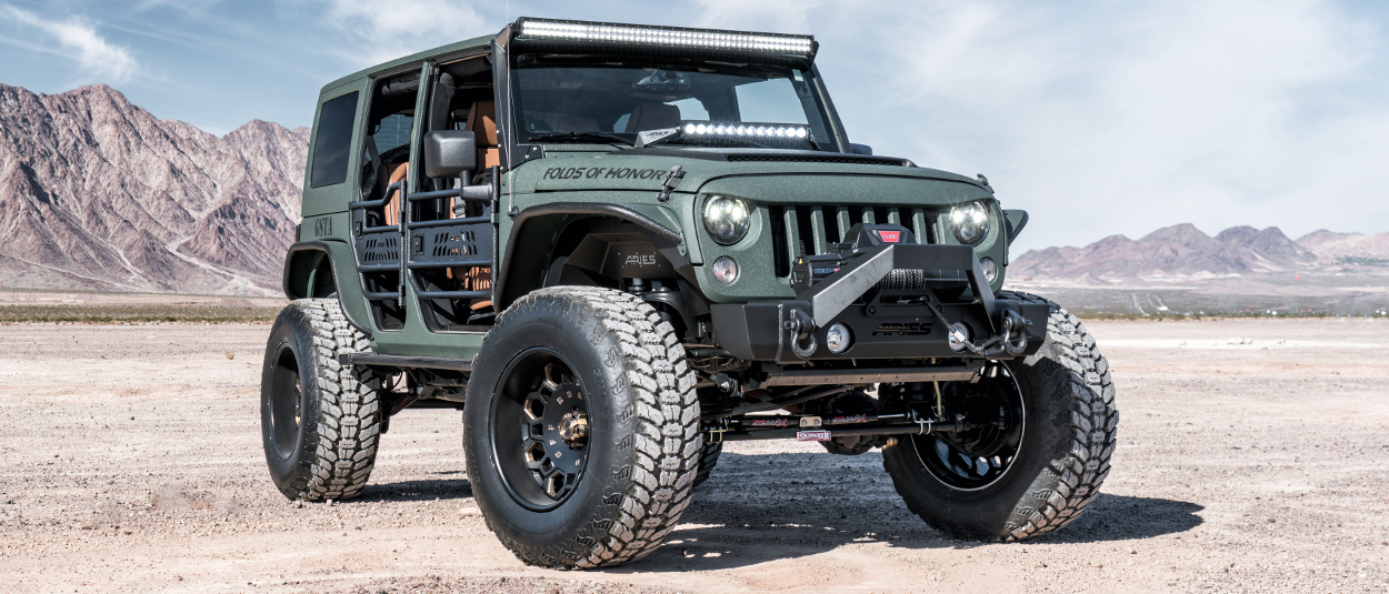 ARIES Jeep Wrangler accessories on custom tactical green Jeep Wrangler JK - desert