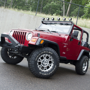 Custom 1999 Jeep Wrangler TJ with ARIES LED lights