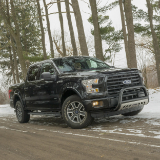 Black 2015 Ford F150 with ARIES RidgeStep truck running boards and truck accessories