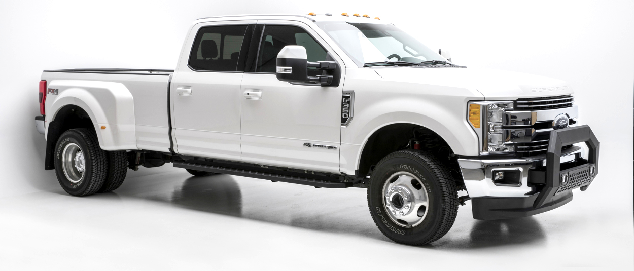 White 2017 Ford F350 Super Duty work truck with ARIES RidgeStep running boards