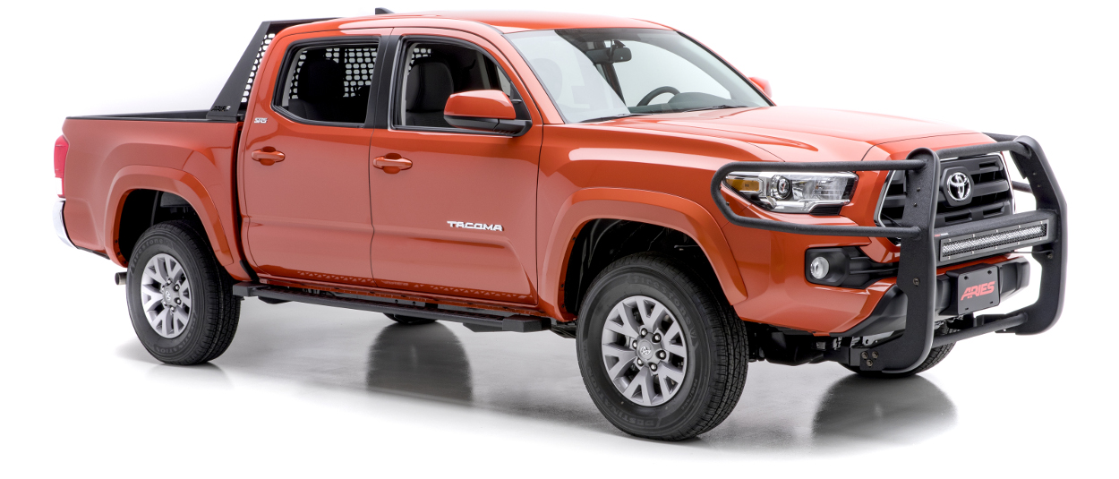 Custom red 2017 Toyota Tacoma with ARIES Rocker Steps and truck accessories Custom red 2017 Toyota Tacoma with ARIES Rocker Steps and truck accessories