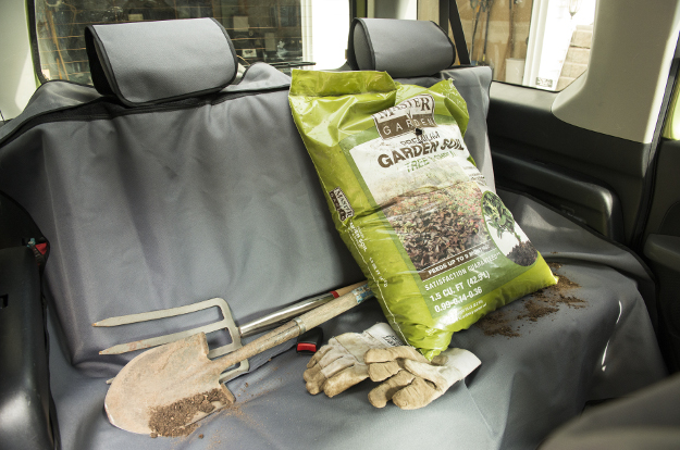 ARIES Seat Defender™ bench seat cover with dirty tools