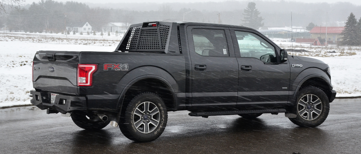 ARIES Switchback® aluminum headache rack on 2015 Ford F150 in the snow