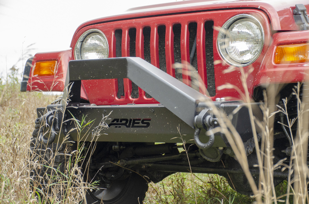 ARIES TrailCrusher® Jeep bumper on red 1999 Jeep Wrangler TJ