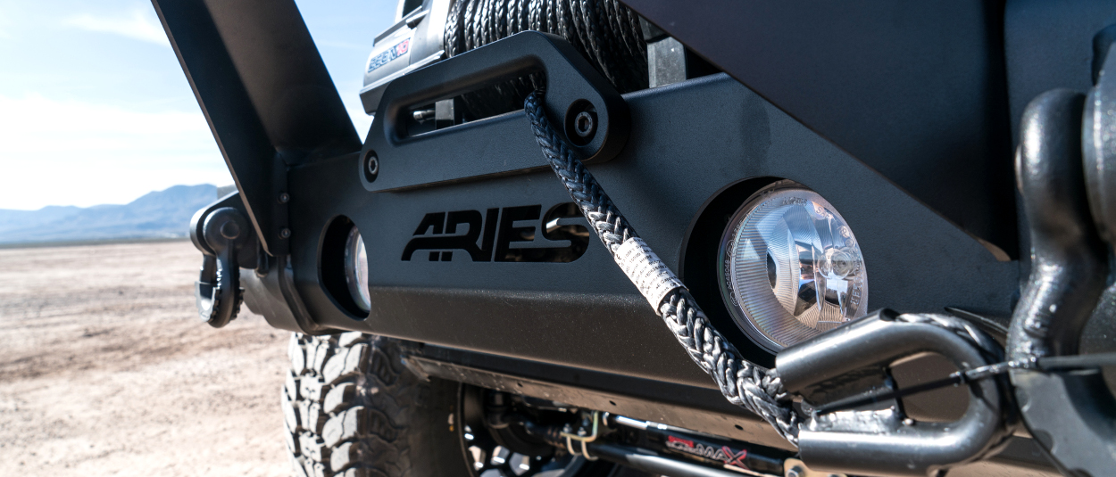 ARIES TrailCrusher® Jeep Wrangler bumper with winch hawse fairlead and shackles ARIES TrailCrusher® Jeep Wrangler bumper with winch hawse fairlead and shackles