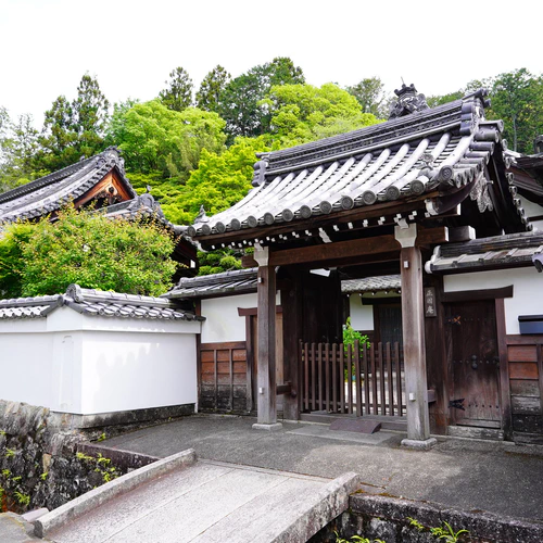 Traditional Japanese residence gate and stone pathway