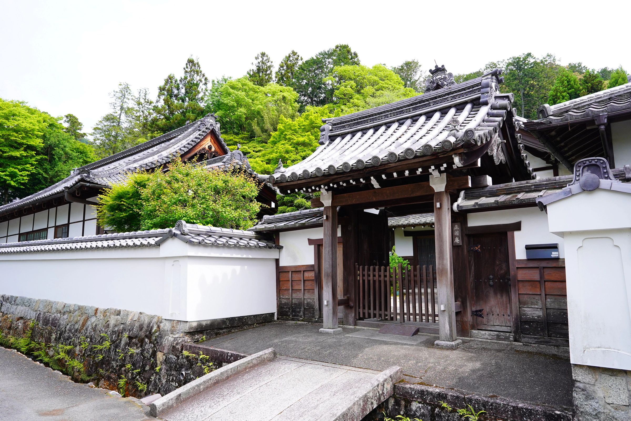 Traditional Japanese residence gate and stone pathway