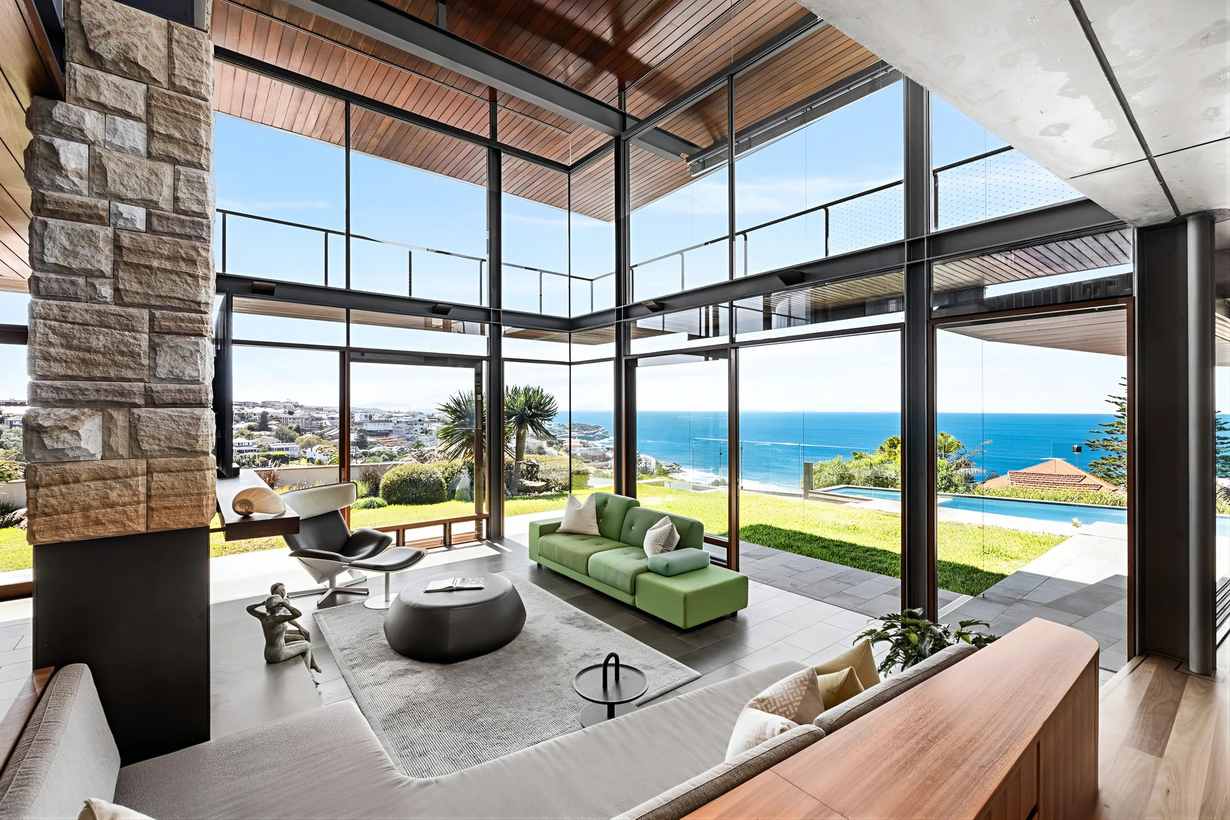 High ceilings in the lounge area provide panoramic views over the beach