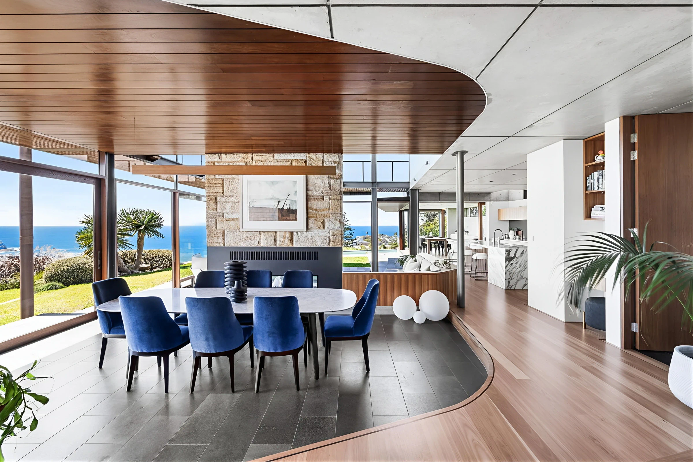 Modern dining room interior with ocean view