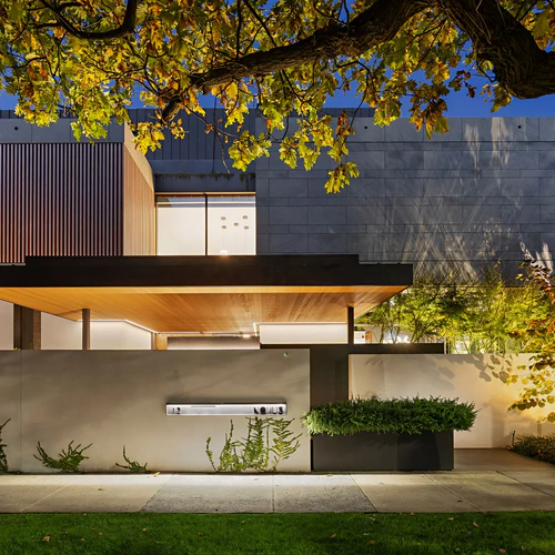 Modern luxury house exterior with illuminated façade