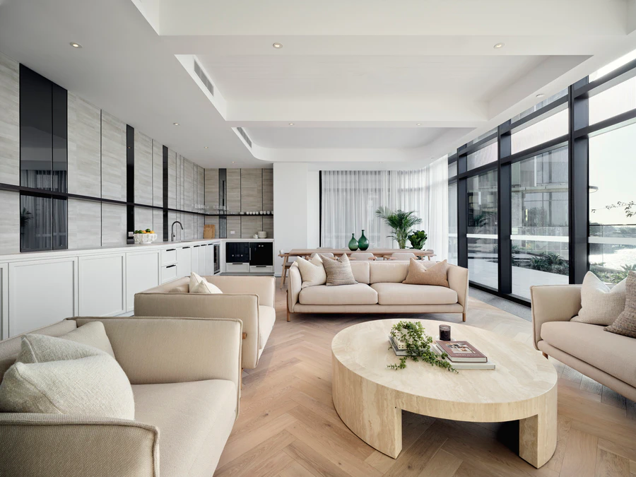 Relaxed casual lounge, featuring designer furnishings and bespoke joinery, for residents to unwind or entertain