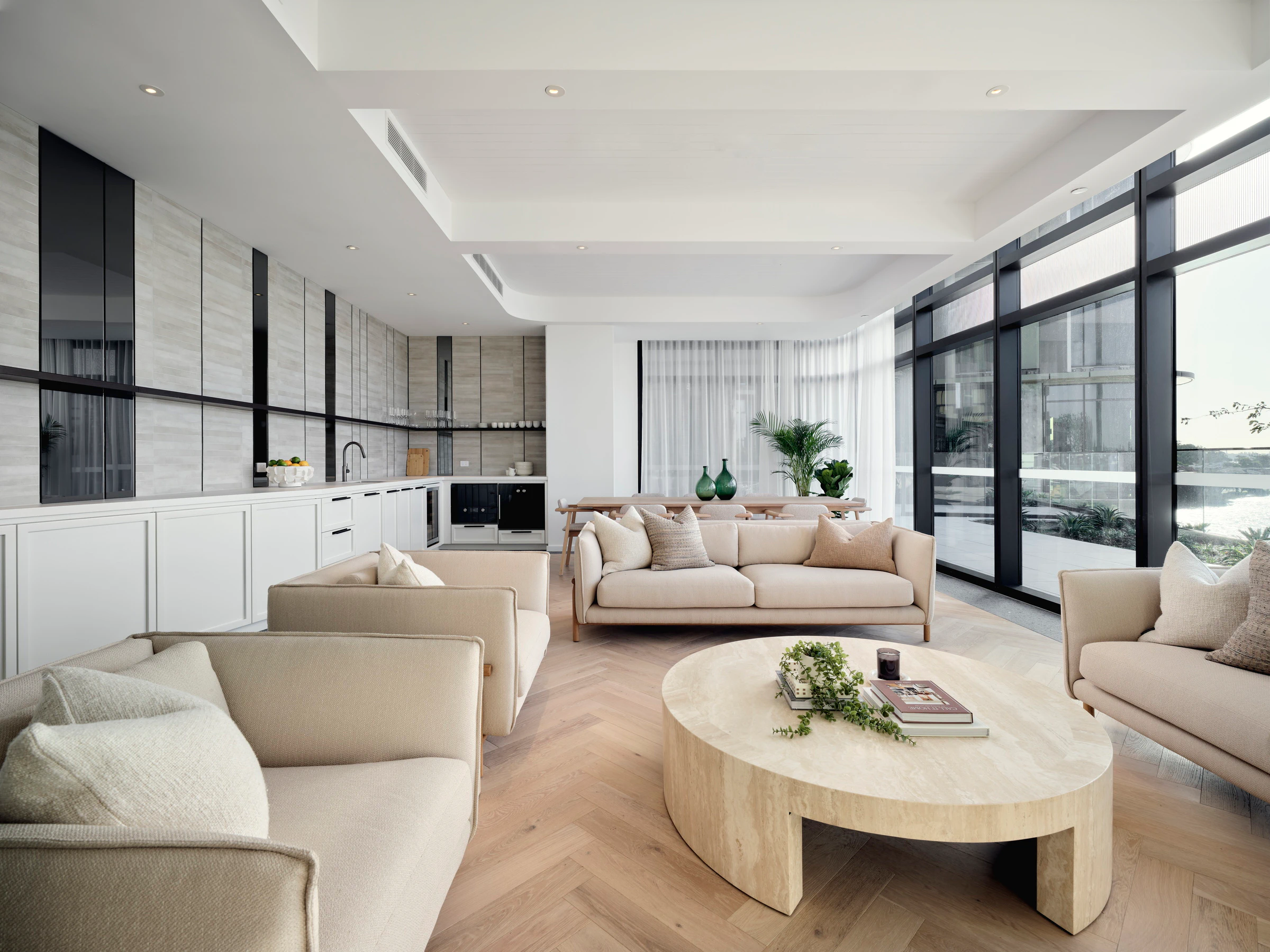Relaxed casual lounge, featuring designer furnishings and bespoke joinery, for residents to unwind or entertain