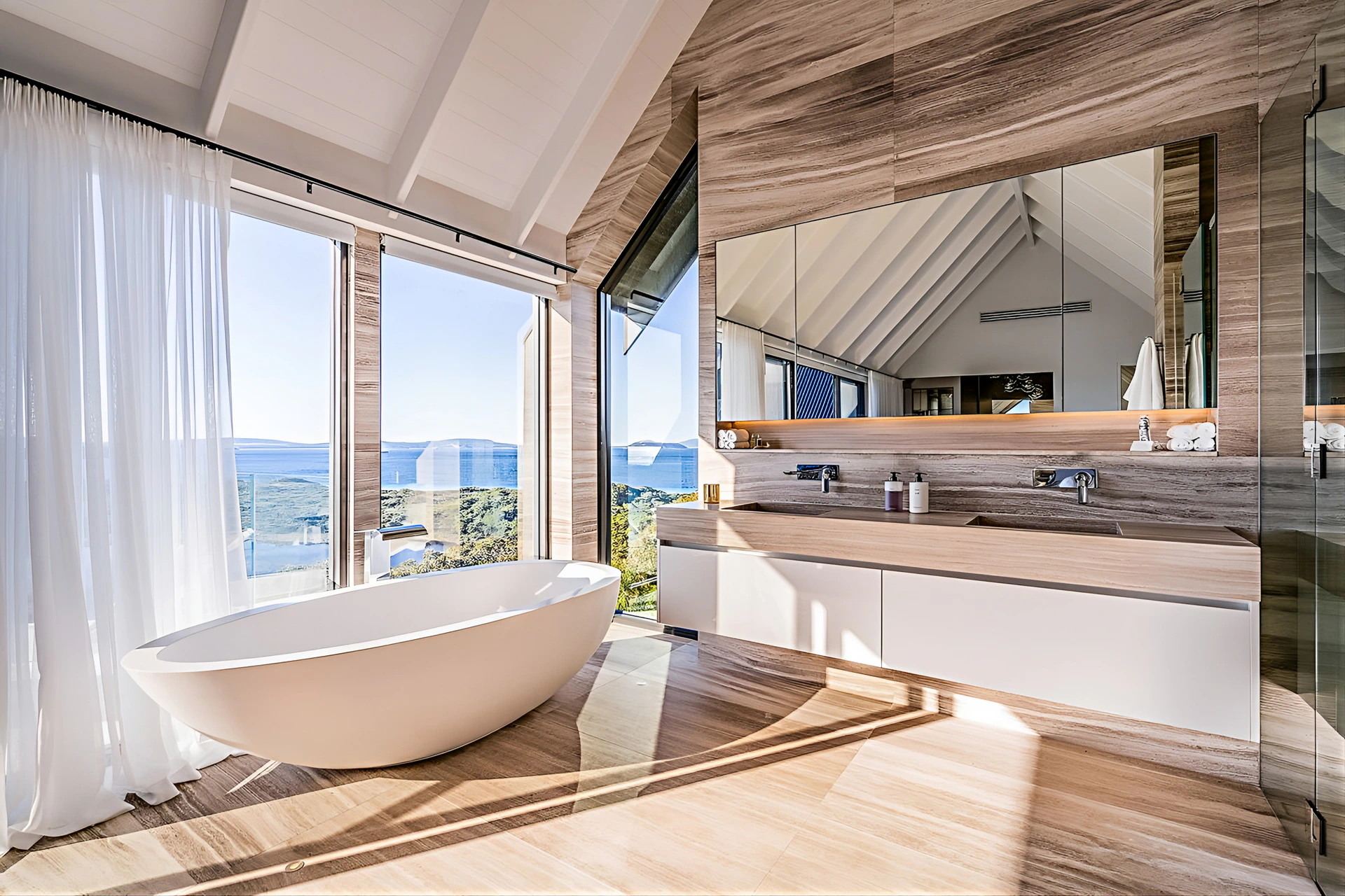 Bathroom interior featuring freestanding bathtub and panoramic sea view