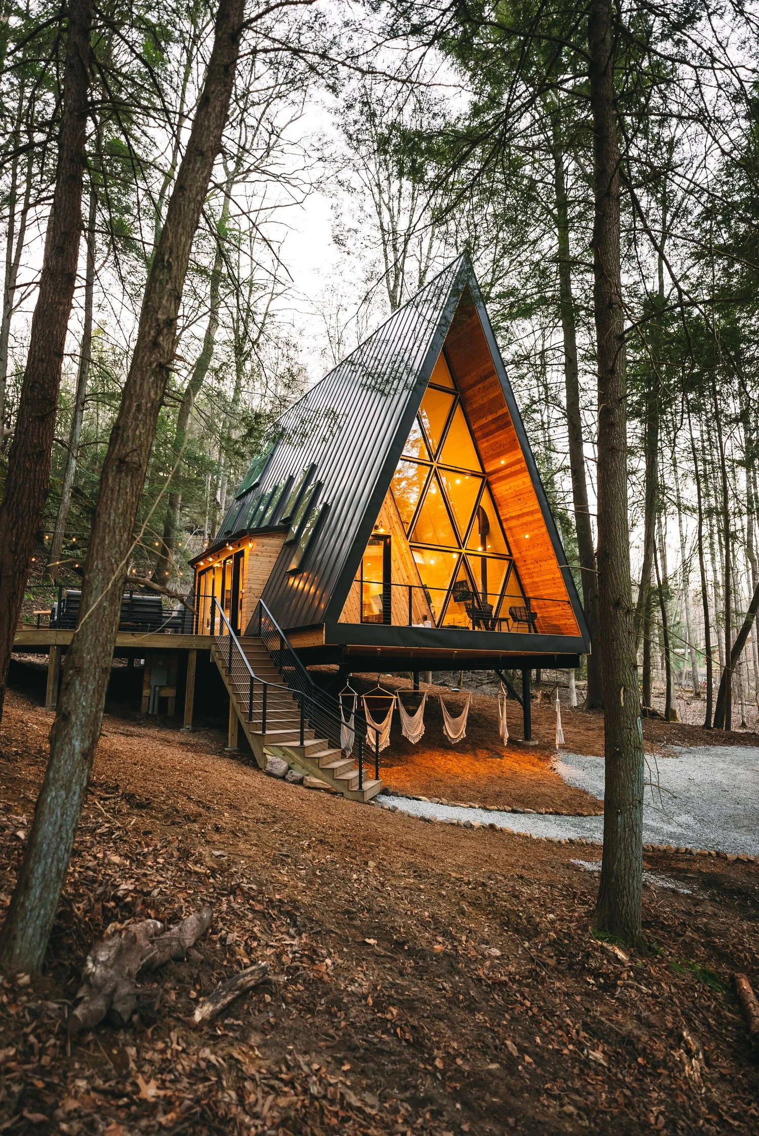 A-frame cabin in forest setting