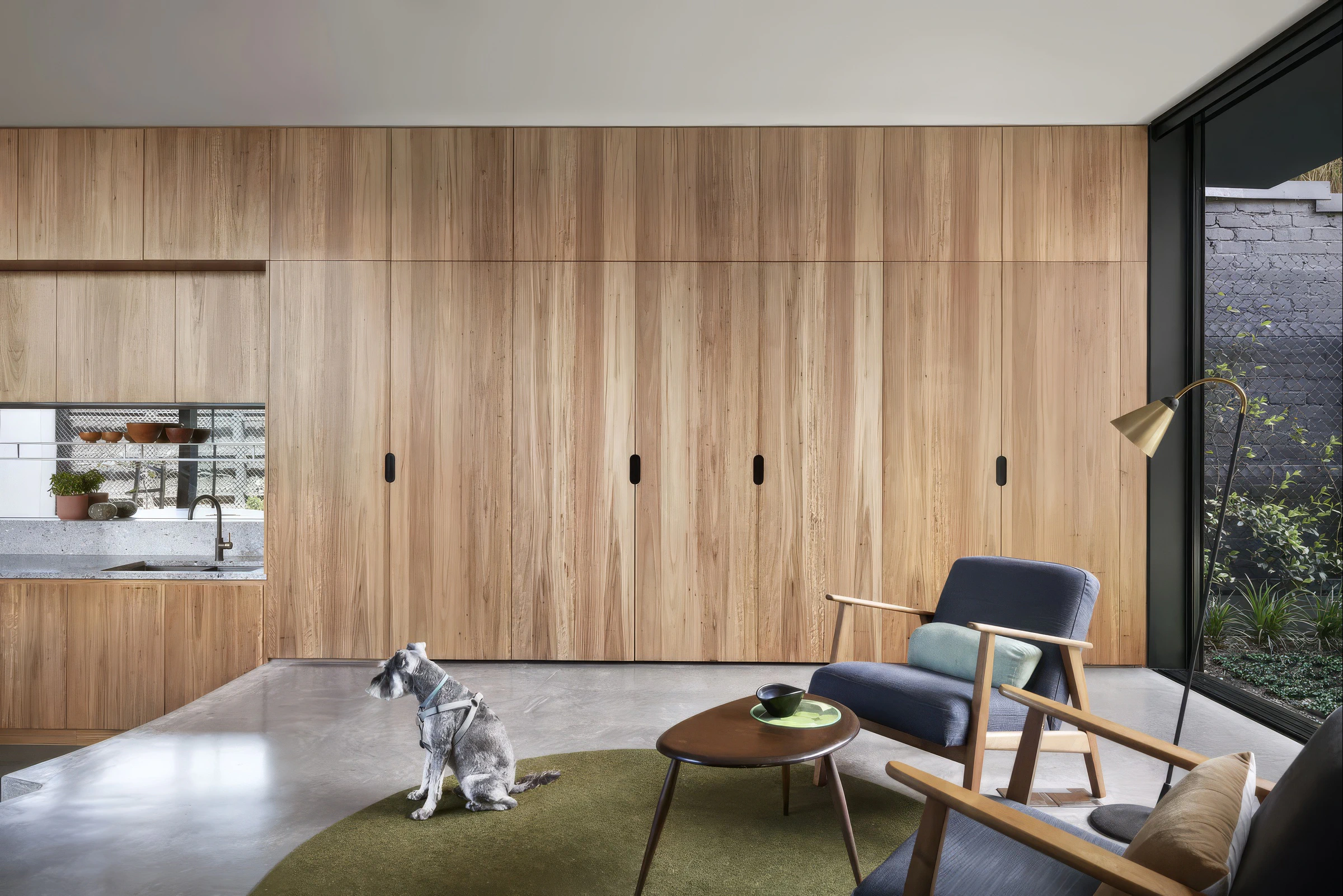 Timber wall cabinetry in open-plan living area