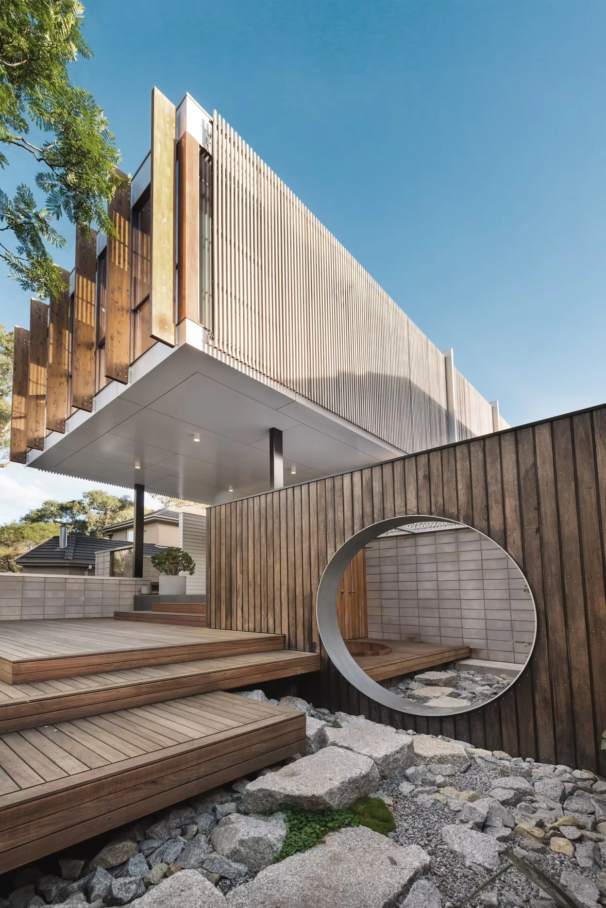 Modern building with wooden paneling and geometric design elements