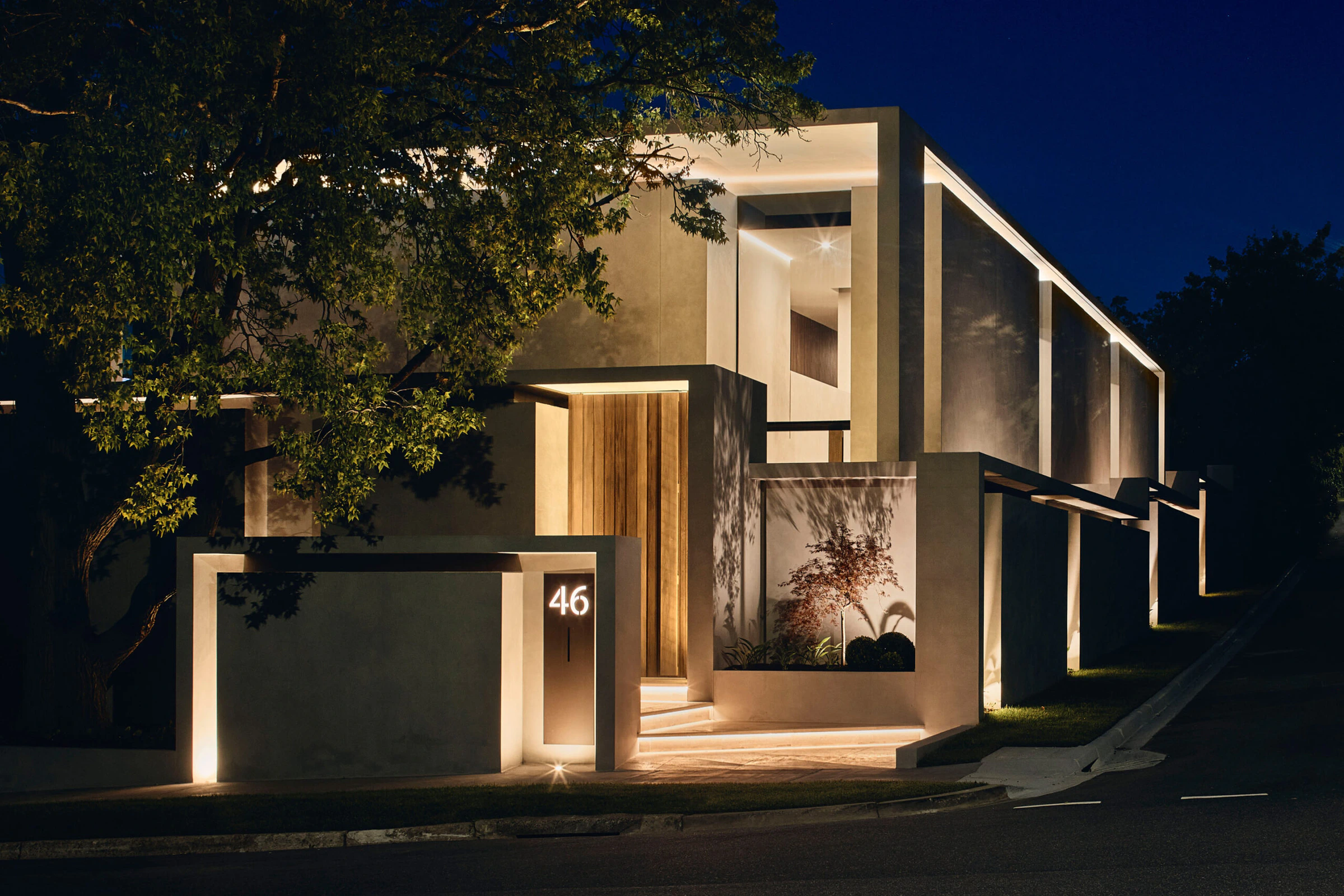 Concrete Hopetoun house exterior and illuminated entry at night