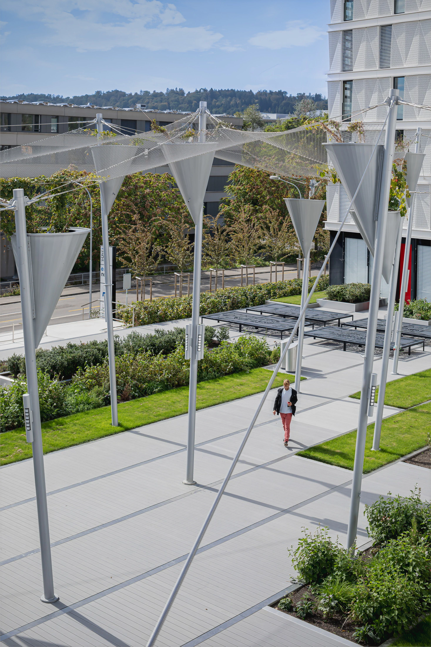 Planted cable canopy over Emil North plaza walkway