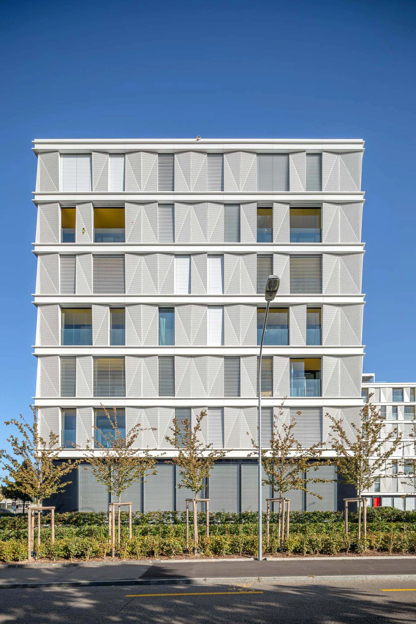 Emil North apartment façade and integrated solar shading panels